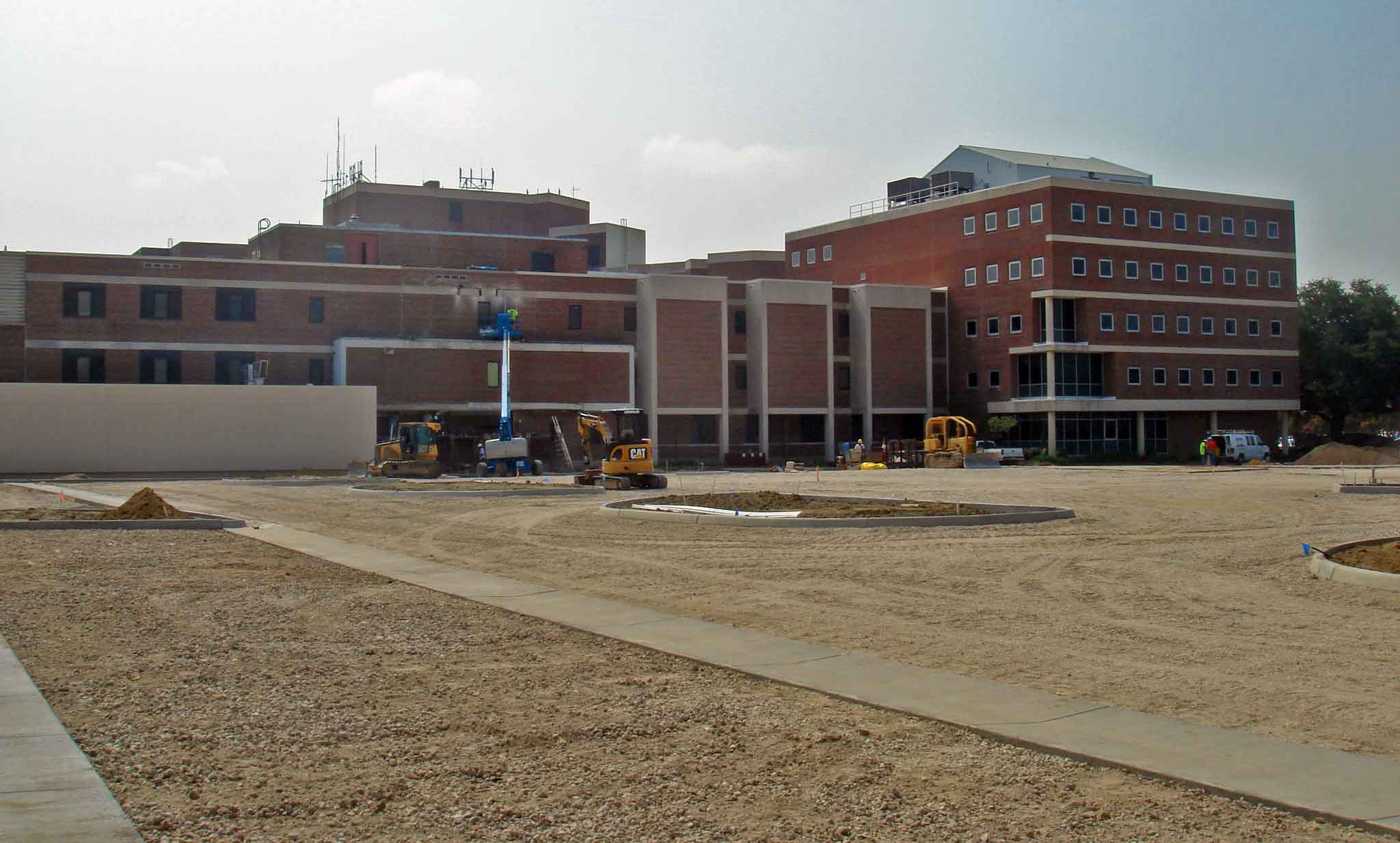 Clearing and grading from post demolition with recycled concrete for new parking lot at DePaul Hospital